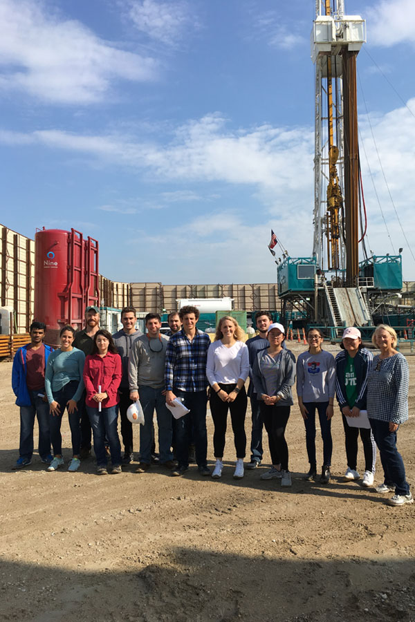 Master's in Energy Management students at a drilling site visit